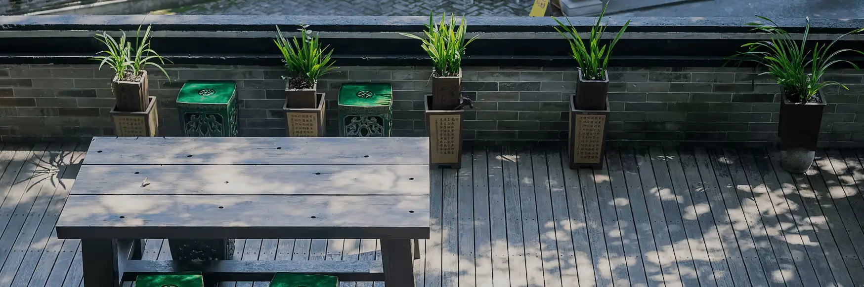 Custom wood deck with outdoor furniture built by JCM Construction in Northern New Jersey
