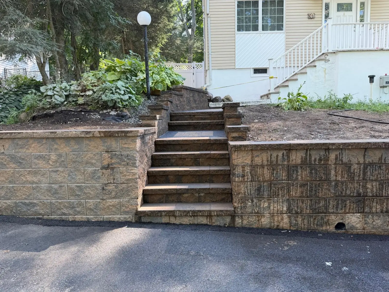 Retaining wall with stone steps